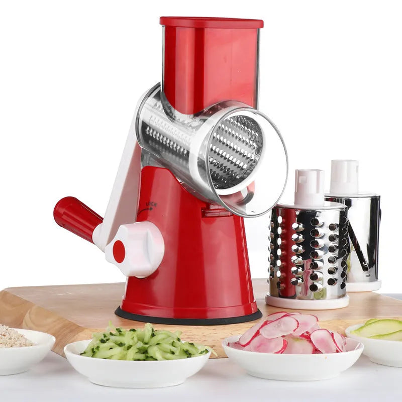 Blue multi-function food chopper with suction cup base for slicing, grating and shredding vegetables.