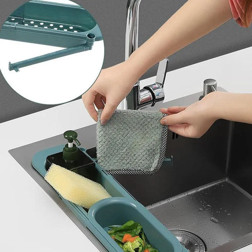 Adjustable telescopic sink rack organiser with drainage basket in kitchen sink