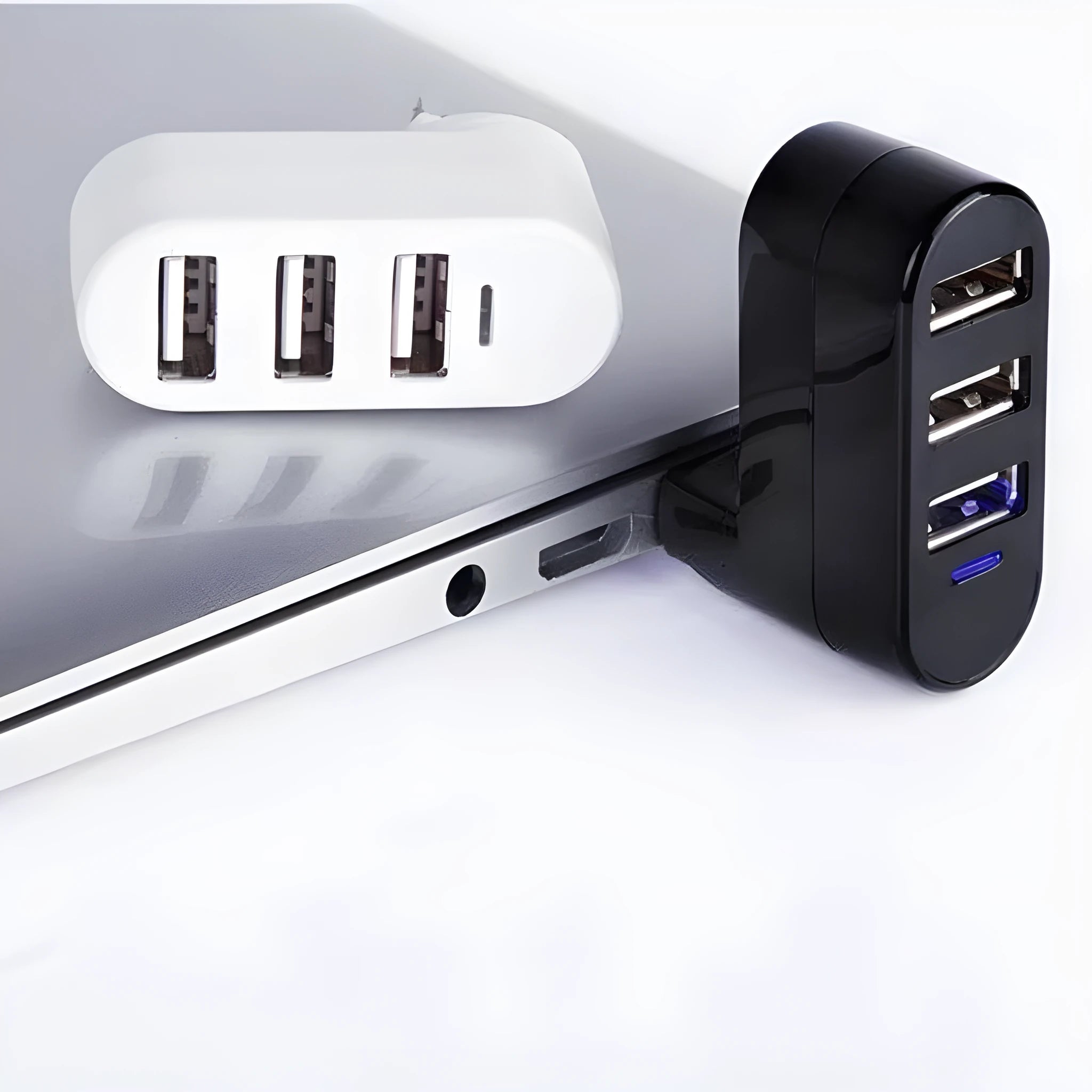 Black and white USB hub splitter with multiple USB 2.0 ports for computer expansion