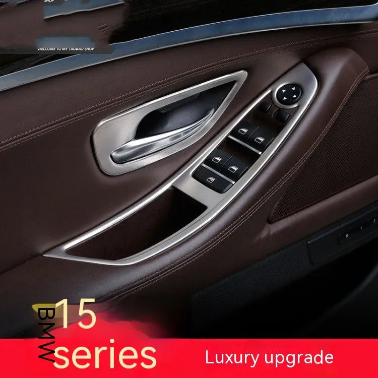 Four silver-finished interior handle decorative frames for BMW 5 Series F10 F11 models on a dark background.