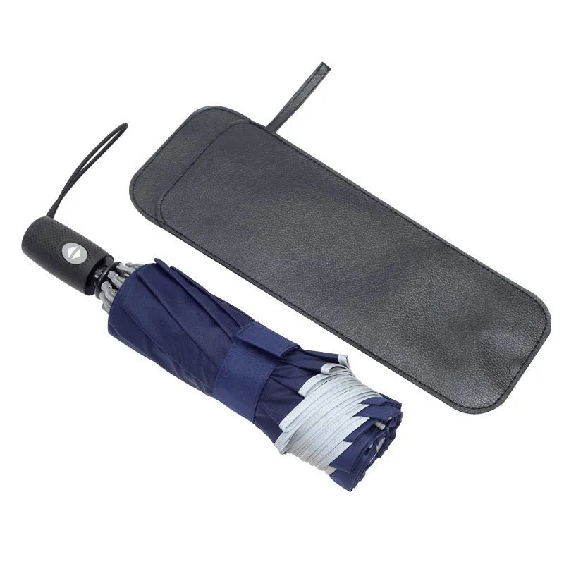 Black automatic reverse folding car umbrella showing inverted closure mechanism and plastic non-slip handle.