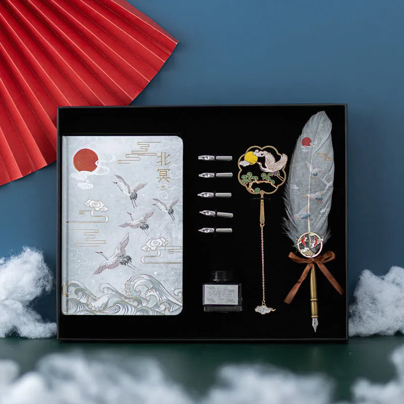 Chinese style metal feather pen set with notebook in gift box, showing feather detail.