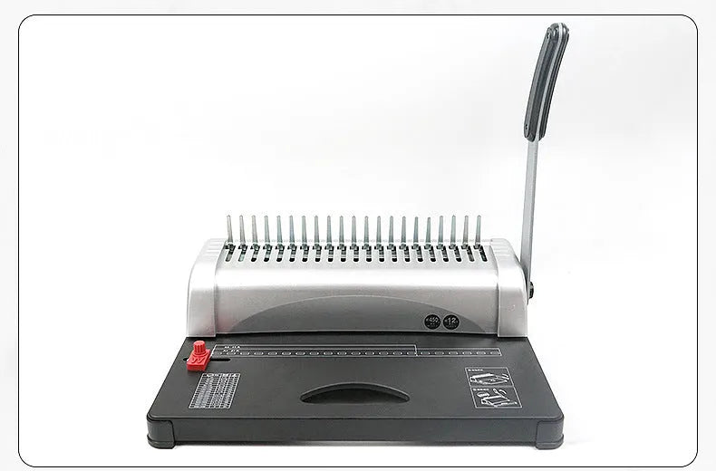 White A4 manual comb binding machine with 21-hole clamp strip and 10-hole apron strip options on desk