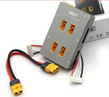 Grey Astor parallel charging board for RC vehicle batteries with multiple connection points