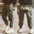 Boys' spring casual overalls with letter print and zip placket in black or army green, sizes 110 to 170.