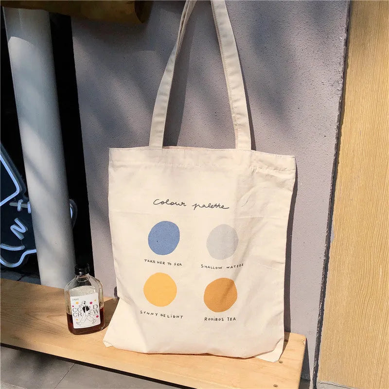 Women's canvas tote bag with geometric pattern print and double soft handles