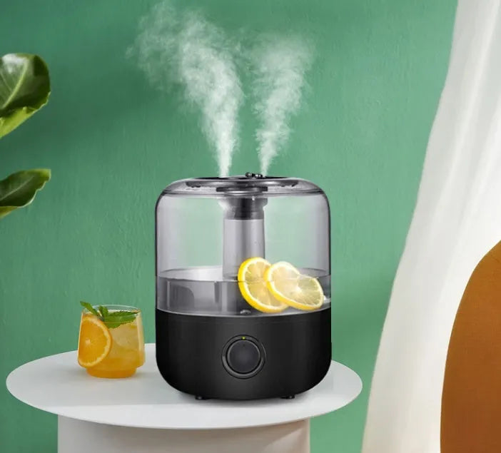 Black or white 3-litre ultrasonic humidifier with mechanical dial control on top.