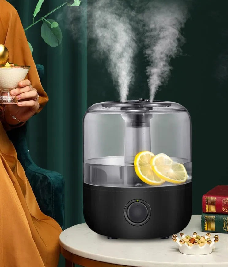 Black or white 3-litre ultrasonic humidifier with mechanical dial control on top.