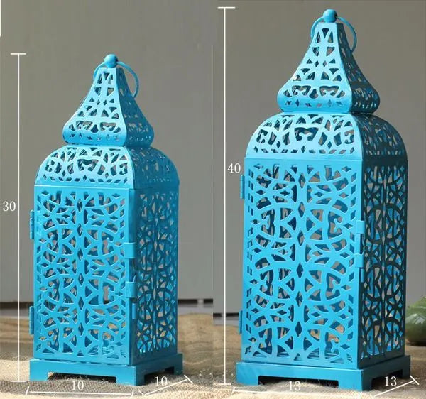Geometric patterned Moroccan-style iron lantern candle holder in blue colour