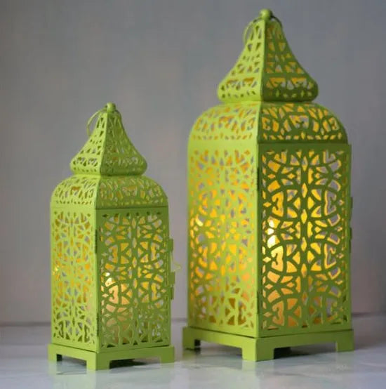 Geometric patterned Moroccan-style iron lantern candle holder in blue colour