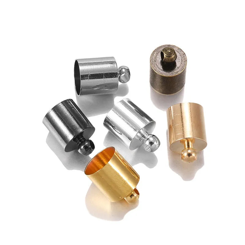 Assortment of small copper pendant weight caps in gold, silver, bronze, and black electroplated finishes.