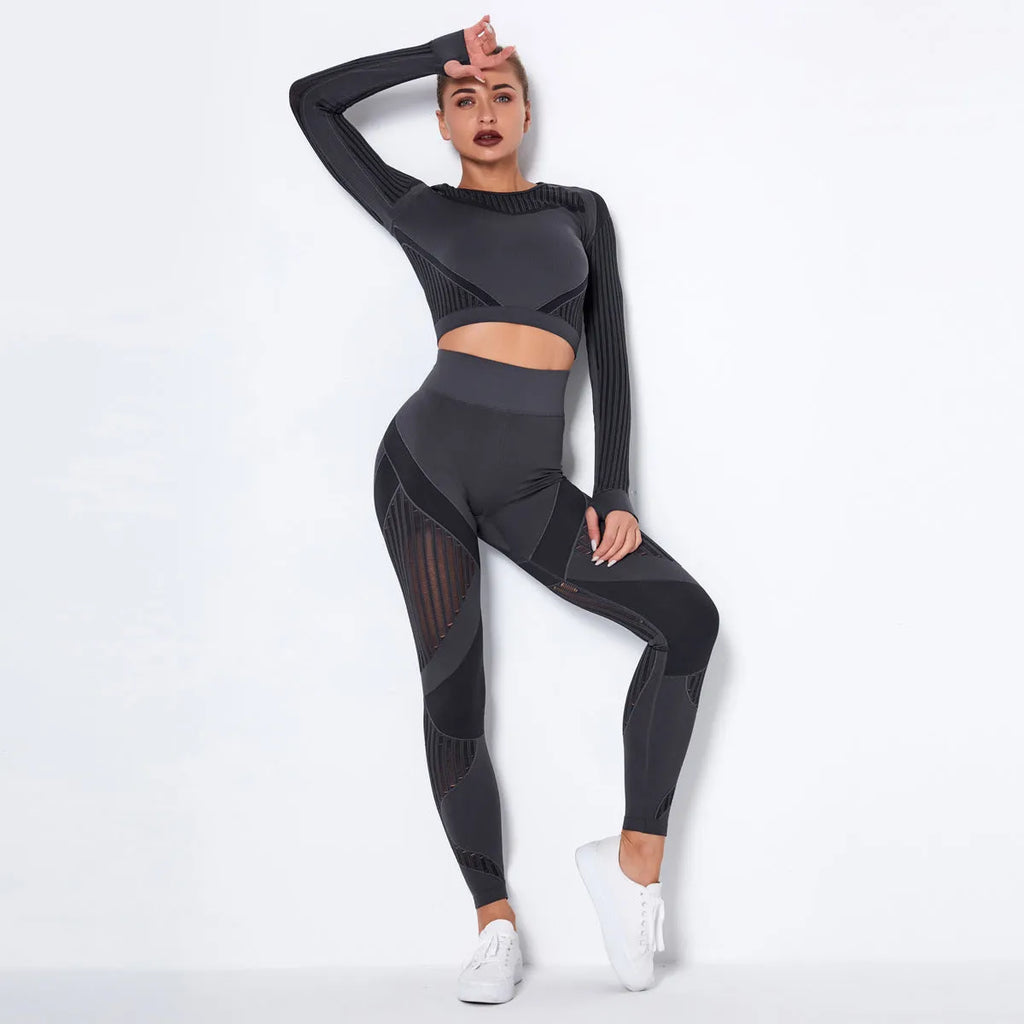 Woman wearing a seamless long-sleeved striped yoga suit in a stretch pose.