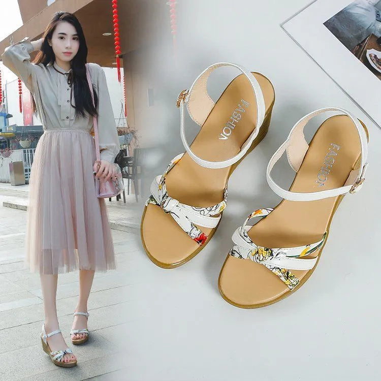Women's pink wedge sandals with thick heel, fish mouth open toe, and buckle closure
