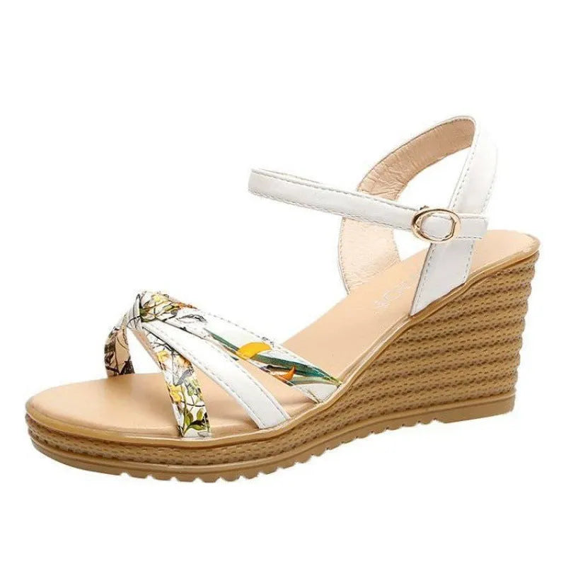 Women's pink wedge sandals with thick heel, fish mouth open toe, and buckle closure