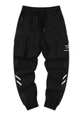 Men's straight-leg casual trousers in black nylon blend fabric with micro-elastic waist on a plain background