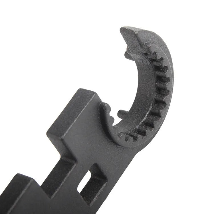 Black all-steel multi-function combination wrench for AR-15 and M4 firearm maintenance.