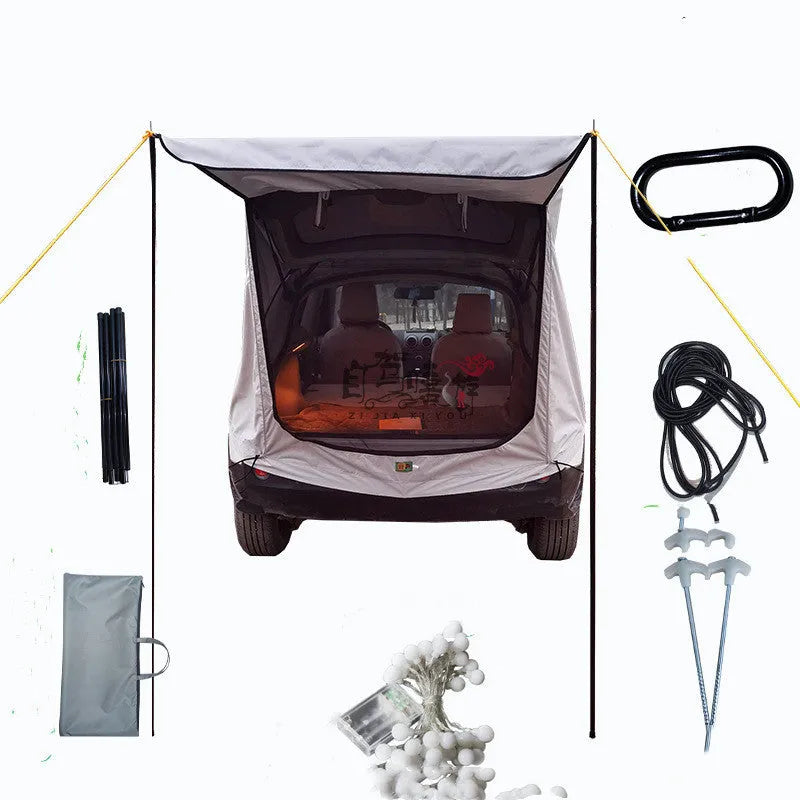 Car trunk extension tent attached to rear of SUV showing cloth door and screen door with reflective strip