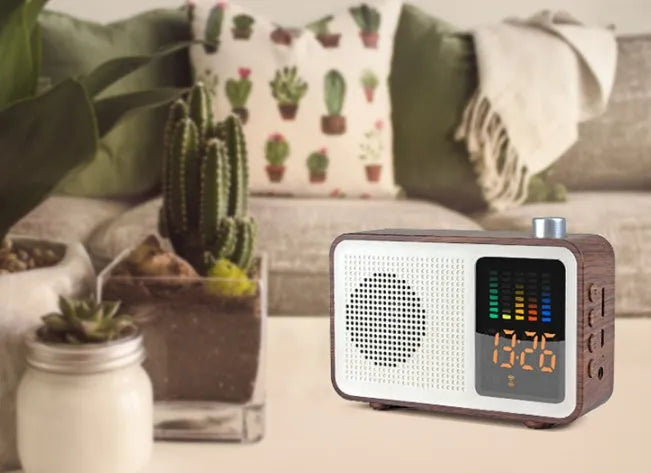 Brown retro Bluetooth speaker with woodgrain finish showing FM radio and connectivity ports