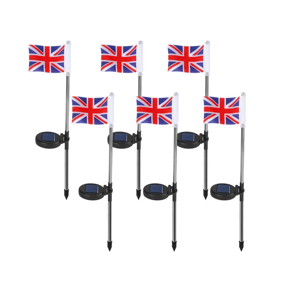 Solar garden flag light with stainless steel pole showing American flag design illuminated by white LEDs