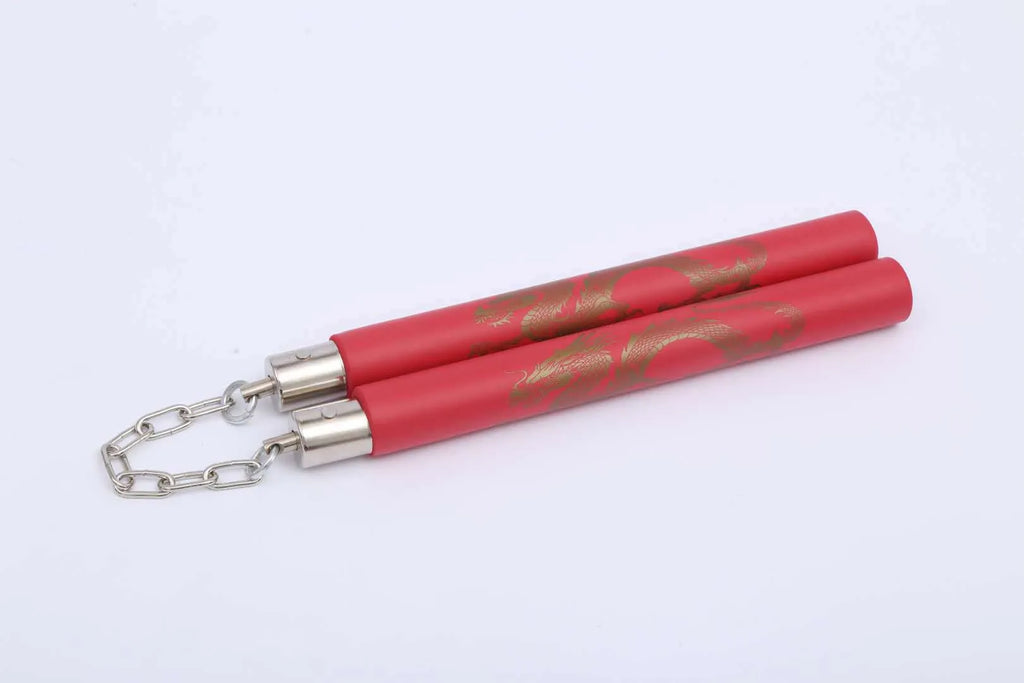 Red foam nunchaku with sponge padding for martial arts training and safe play.