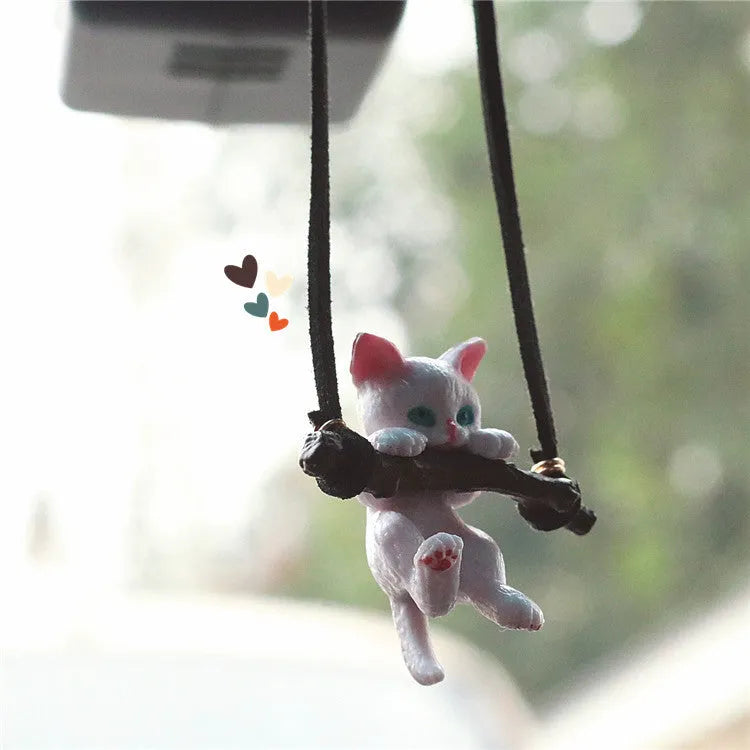 White non-woven fabric branch cat car ornament hanging from a rearview mirror with a traditional Chinese design
