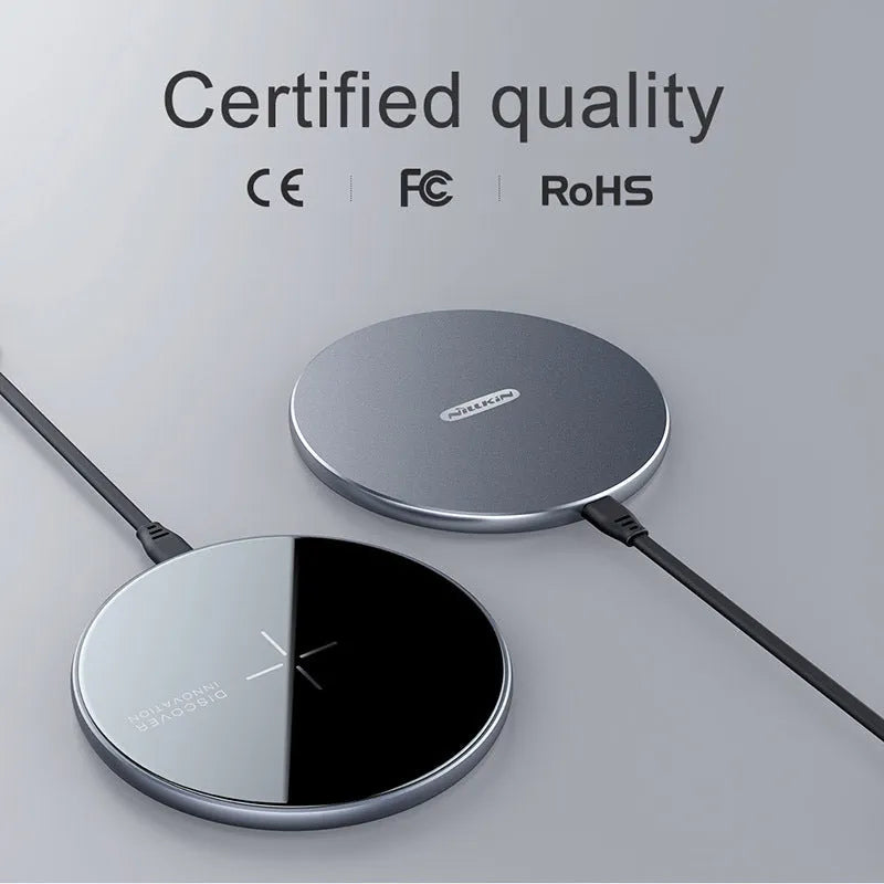 Black MagSlim NKT06 magnetic wireless phone charger on a flat surface.