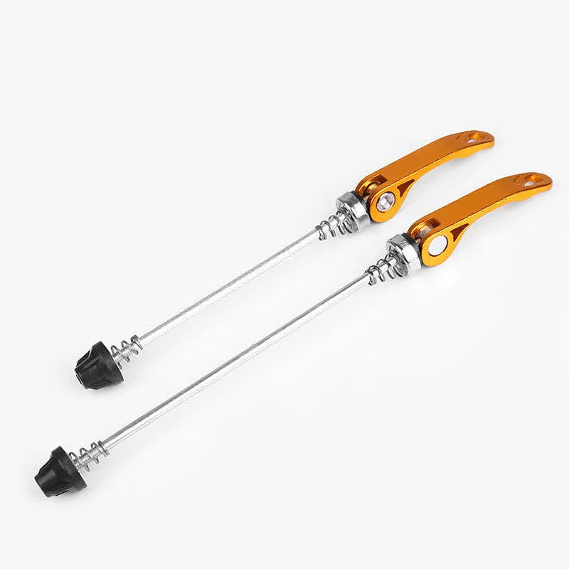 Bicycle quick release lever with galvanised iron rod and coloured aluminium handle on a bike hub.