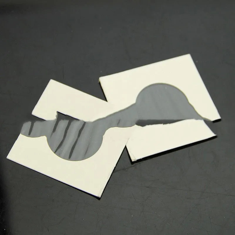 50 white paper coin protector clips in transparent OPP bag packaging for commemorative coin storage