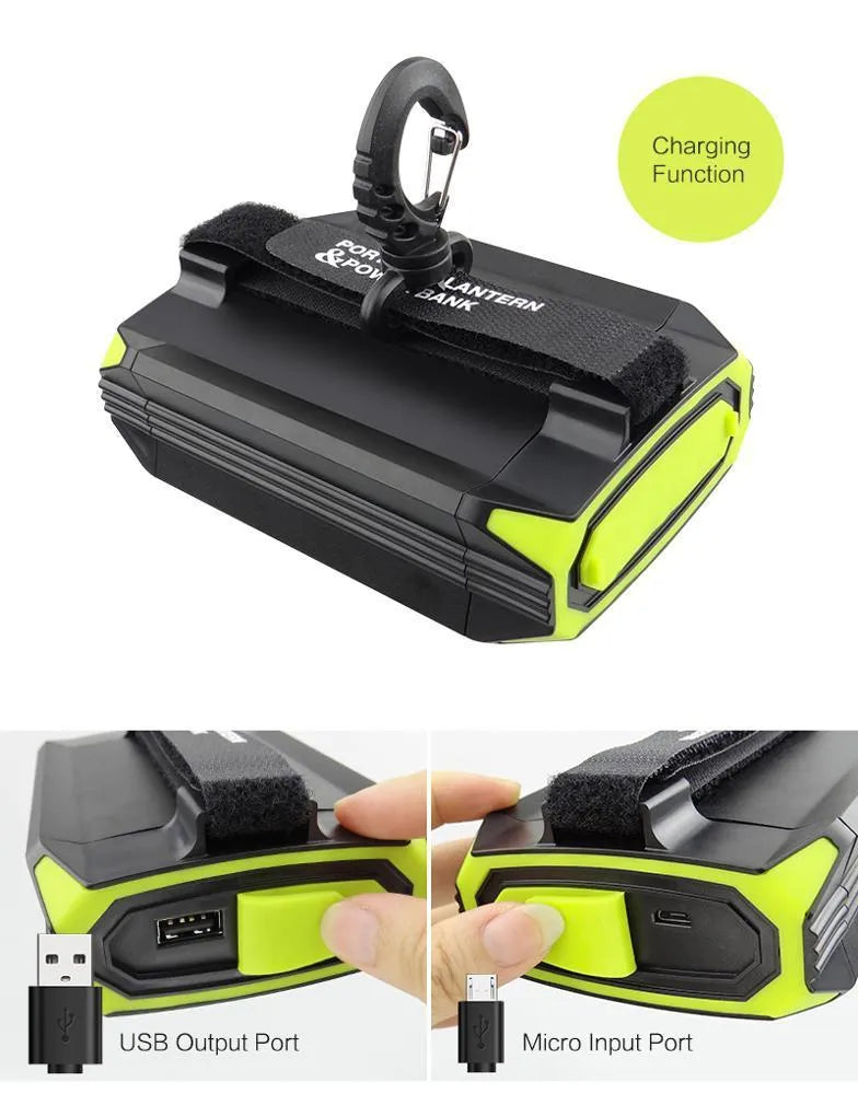Green rechargeable aluminium alloy camping light with power bank function, showing push-button switch.
