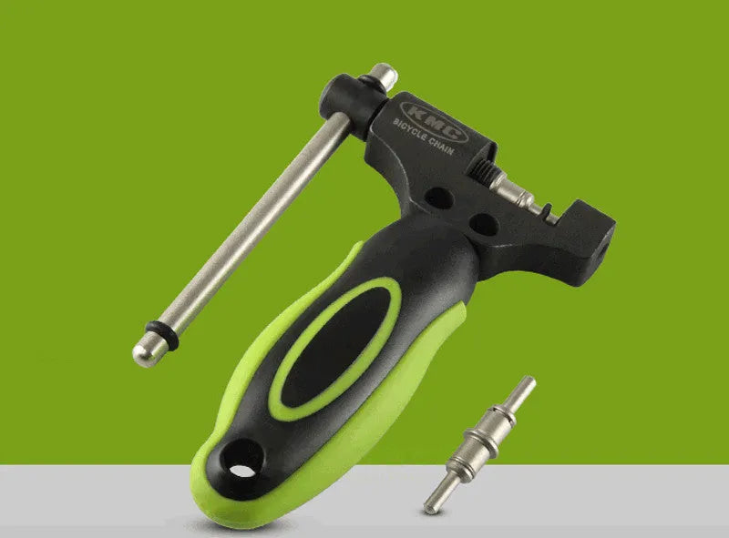 Green steel bicycle chain cutter tool with a double shaft device and included driver