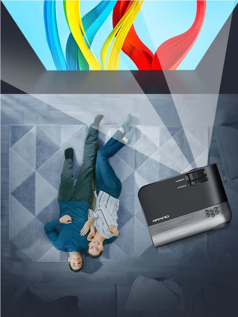 White portable wireless projector with lens, shown on a table for mobile phone casting.