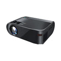 White portable wireless projector with lens, shown on a table for mobile phone casting.