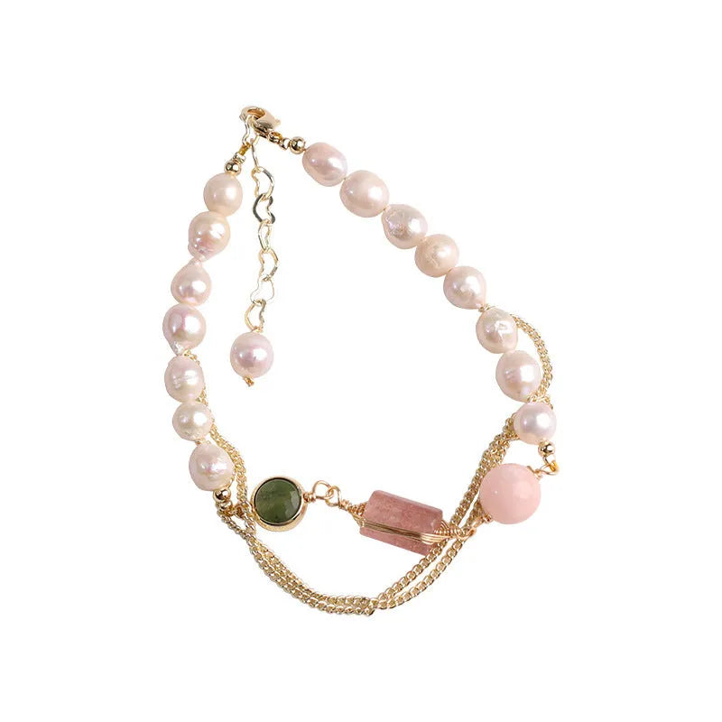 Women's freshwater pearl bracelet with geometric design and strawberry crystal charm in pink