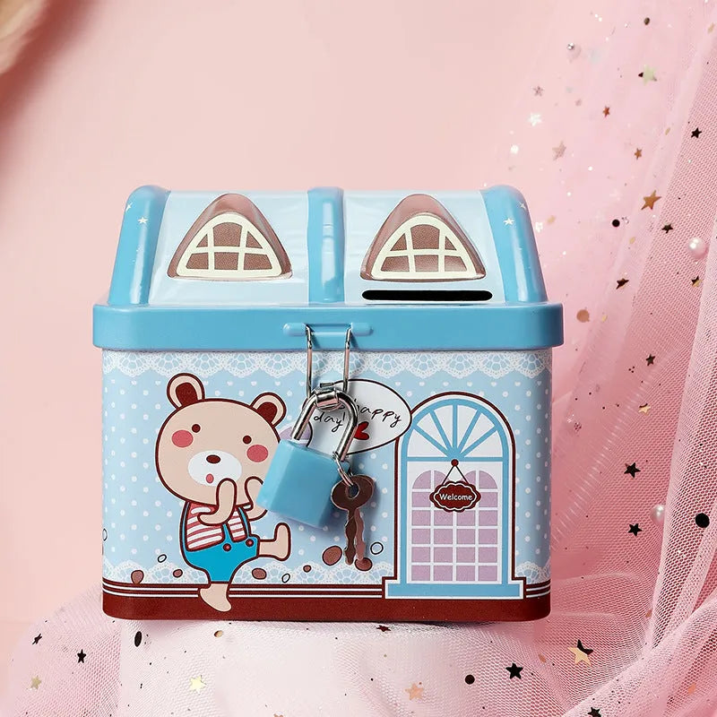 Blue house-shaped tinplate piggy bank for coin storage measuring 112mm tall