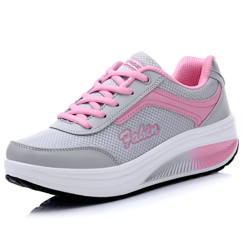 Women's heelless single shoes in grey powder with a mid heel, shown on a plain background.