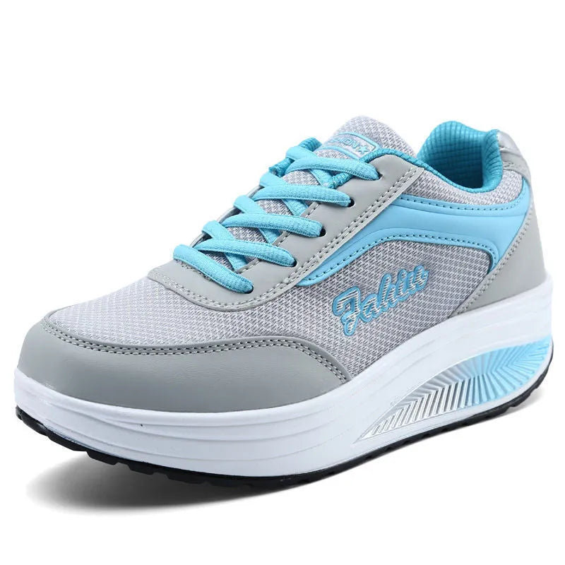 Women's heelless single shoes in grey powder with a mid heel, shown on a plain background.
