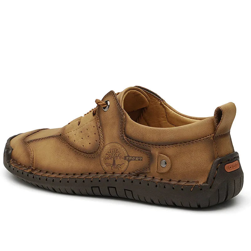 Men's plain black microfibre leather casual slip-on shoes with round toe on a white background.