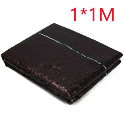 Black polyethylene composite woven weed control cloth for farmland and greenhouse use.