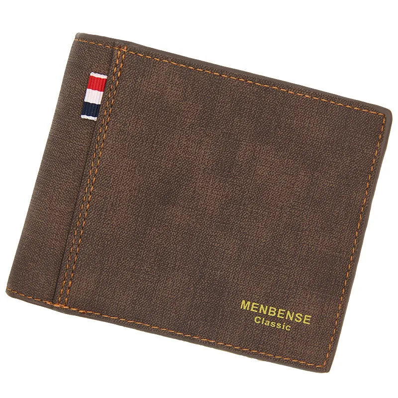Men's black tri-fold leather wallet open showing multiple card slots and cash compartment