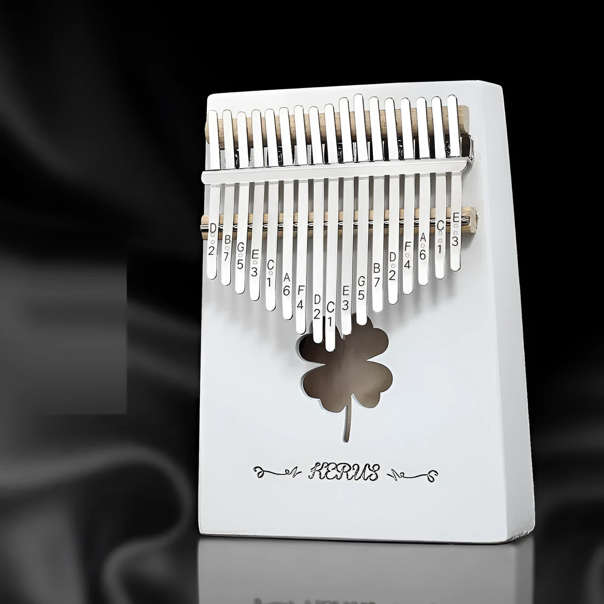 Portable thumb piano kalimba with wooden body and metal tines in multiple colour options