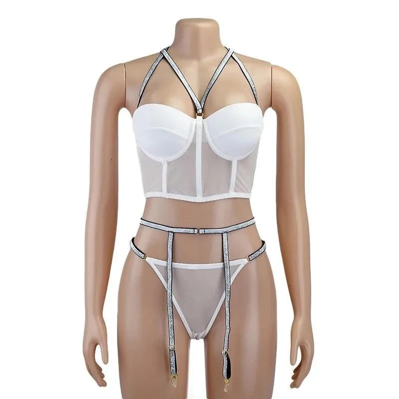 Three-point garter set in black polyester with bra, garter belt, and adjustable garters