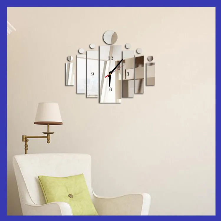 18-inch round acrylic mirror wall clock with gold reflective finish on a light wall