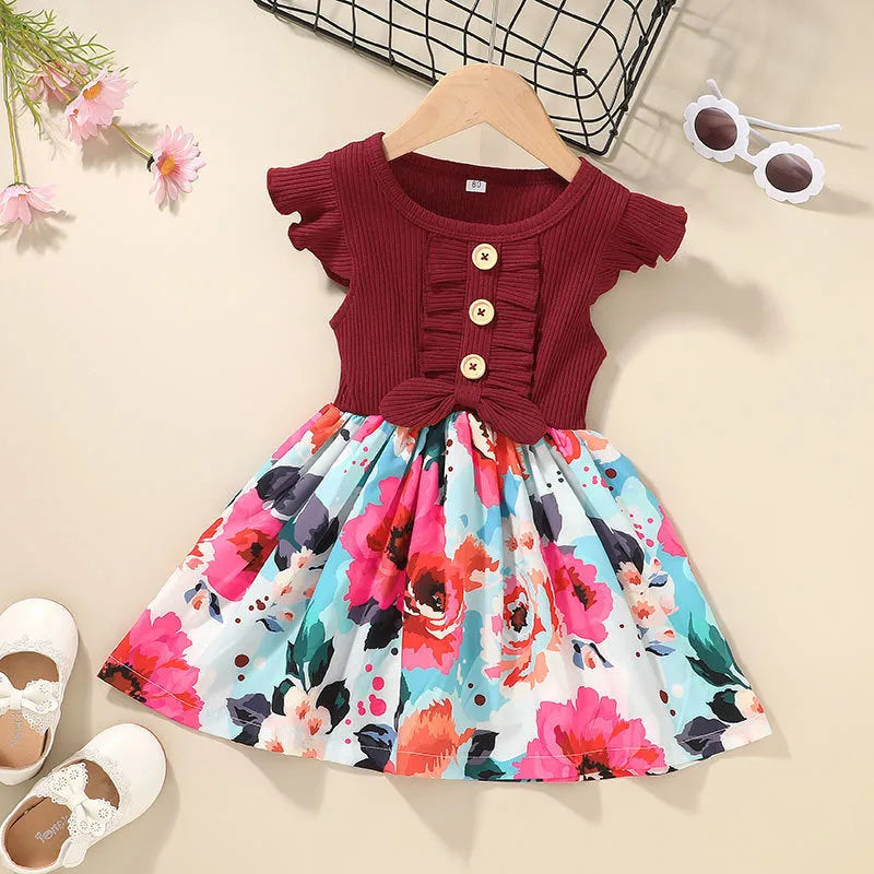 Toddler girl in a sleeveless summer dress, available in multiple colours and sizes from 80cm to 120cm.
