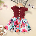 Toddler girl in a sleeveless summer dress, available in multiple colours and sizes from 80cm to 120cm.