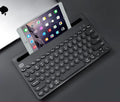 Wireless Bluetooth mouse and keyboard set in pink and black colours
