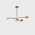 Nordic style LED chandelier with black iron frame and white acrylic shades, shown in a dining room setting.