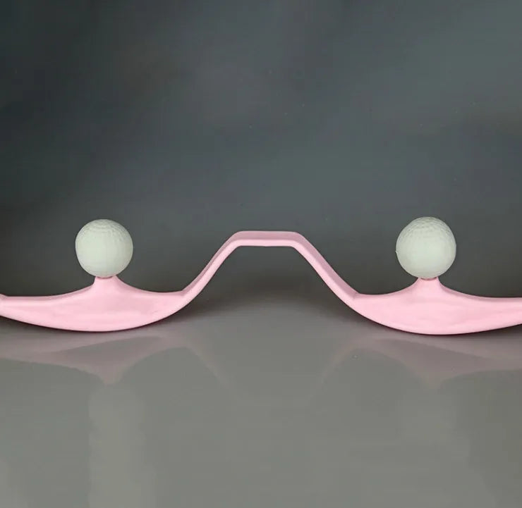 Plastic hand-held neck and shoulder massager with adjustable stand in pink, blue, or green colour.