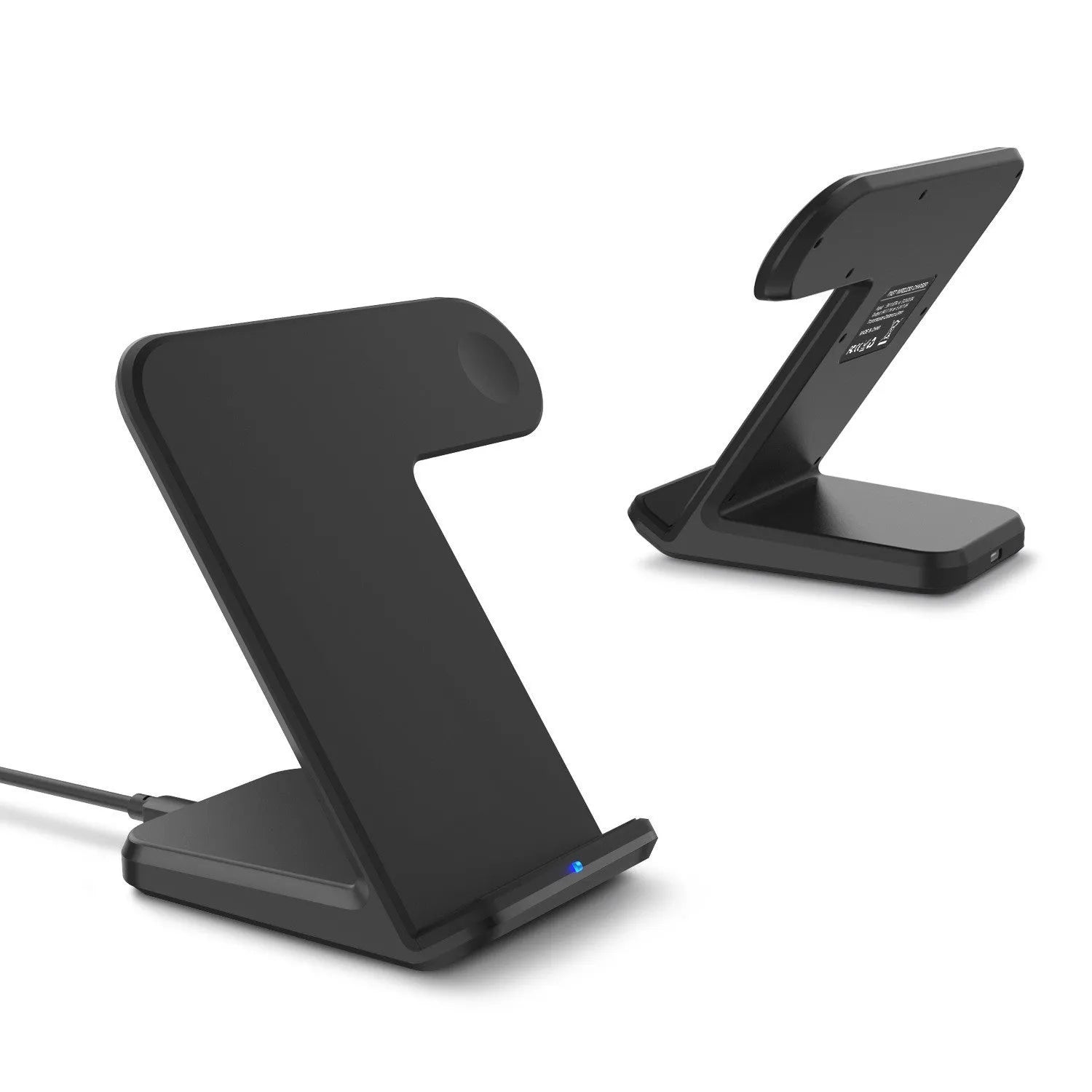 Black or white wireless phone charger with USB-C cable and UK power adapter on desk