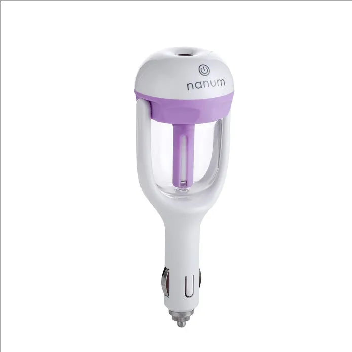 Compact blue car humidifier with essential oil diffuser function on car dashboard