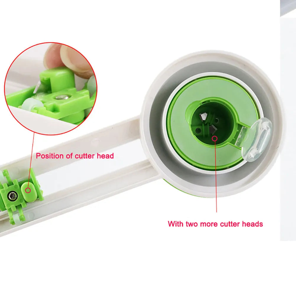 Green or orange plastic round paper cutter for A3 paper on a colour box.